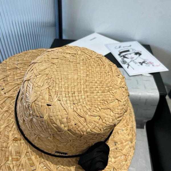 CAPPELLO DI PAGLIA MM IN RAFIA BEIGE CON DECORO DI FIORI NERI
