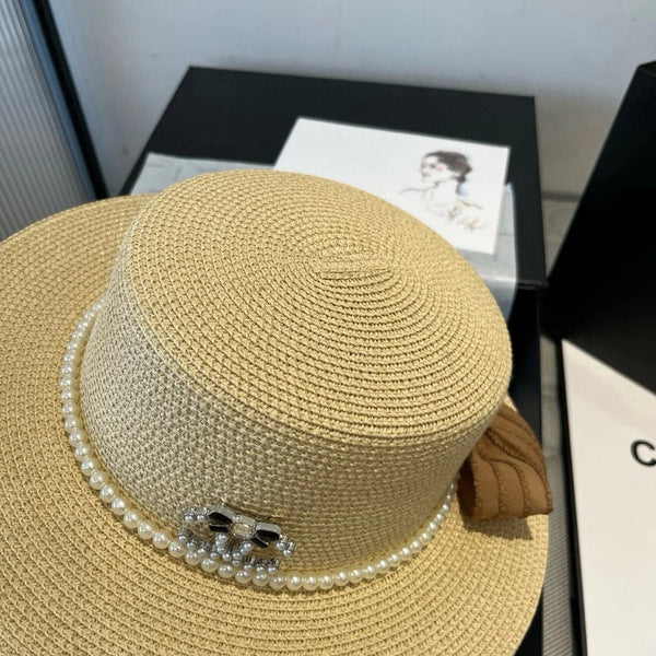 CAPPELLO PIATTO IN PAGLIA CON FIOCCO MARRONE 673922