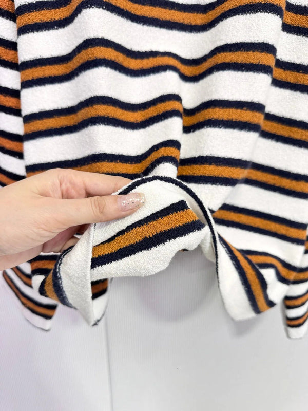 CHANEL POLO EN MAILLE RAYÉE 25S 587