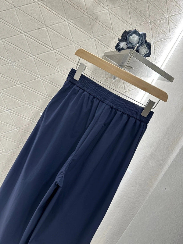 MIUMIU HIGH-WAISTED WIDE-LEG PANTS WITH BOW 276652
