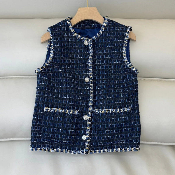 CHANEL Gilet sans manches en tweed 25S 491