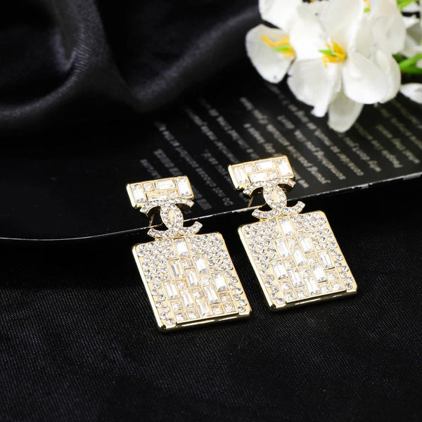 Boucles d'oreilles en or et diamant flacon de parfum CC