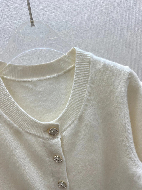 CHANEL CARDIGAN EN TRICOT RAS-DE-COU MANCHES COURTES 25S 317