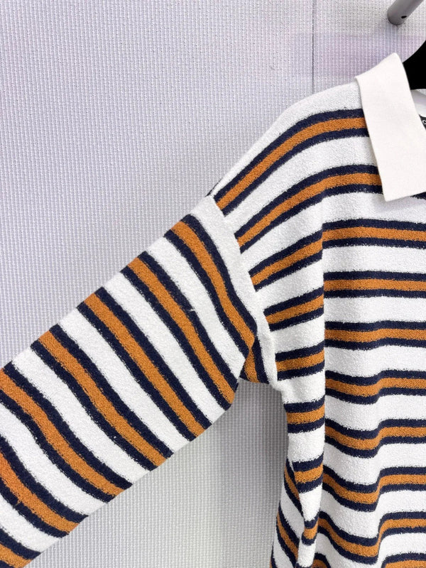 CHANEL POLO EN MAILLE RAYÉE 25S 587