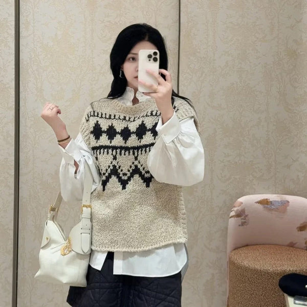 DIOR PULL SANS MANCHES 25S 495