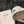 MM CLASSIC REVERSIBLE BUCKET HAT IN LIGHT BEIGE AND BLACK FABRIC