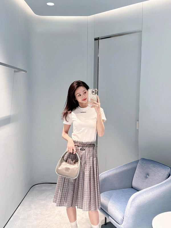 JUPE PLISSÉE À CARREAUX MIUMIU STYLE 718