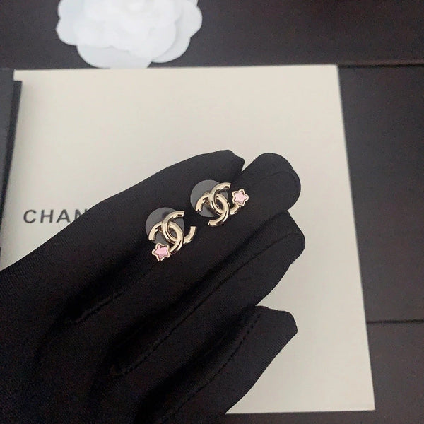 CC Boucles d'oreilles en or avec étoile à cinq branches rose, dernière collection