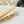 CC 30MM BELT IN GOLDENROD BROWN SHINNY CALFSKIN WHITE LOGO
