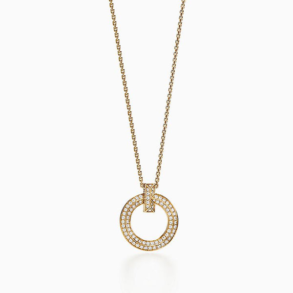 COLLANA CON PEDANTE A T E DIAMANTI