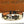 BRACCIALE IN ORO CON 4 MOTIVI IN CORDA DI PELLE LV