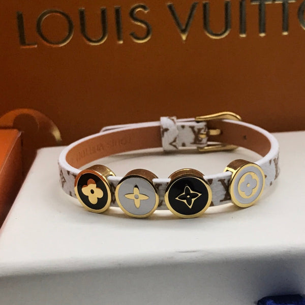 BRACCIALE IN ORO CON 4 MOTIVI IN CORDA DI PELLE LV