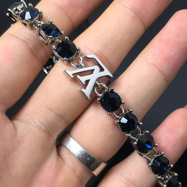 BRACCIALE IN ARGENTO CON PIETRA NERA MONOGRAM LV