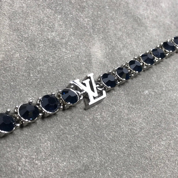 BRACCIALE IN ARGENTO CON PIETRA NERA MONOGRAM LV