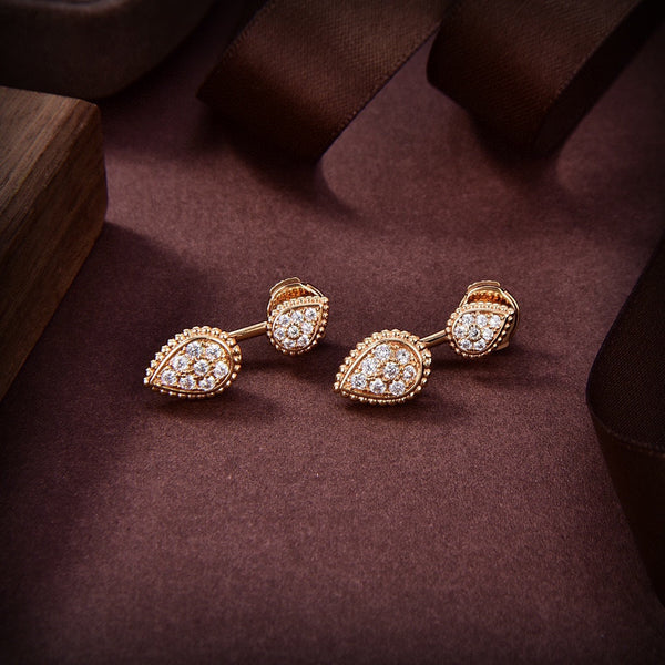 ORECCHINI SERPENT BOHEME IN ORO ROSA CON DIAMANTI A FORMA DI C