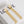 ANAGRAM FRINGE EARRINGS