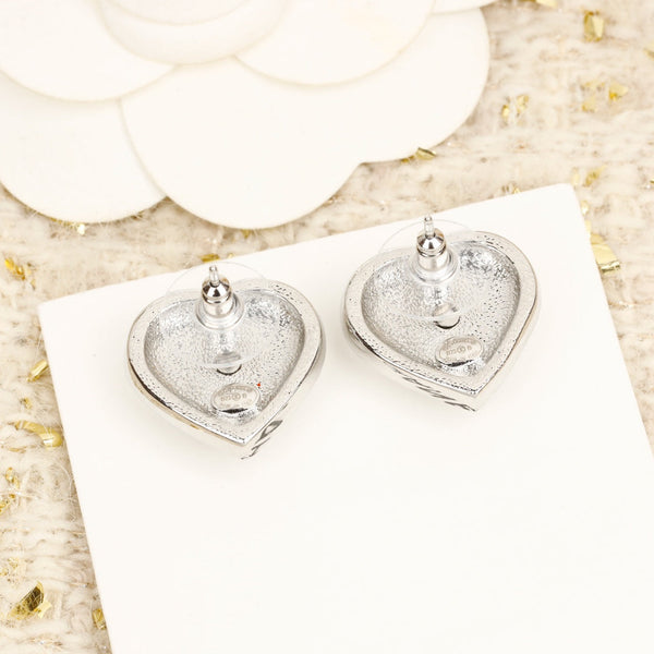 ORECCHINI IN ARGENTO CON CUORE E DIAMANTI CC INTORNO
