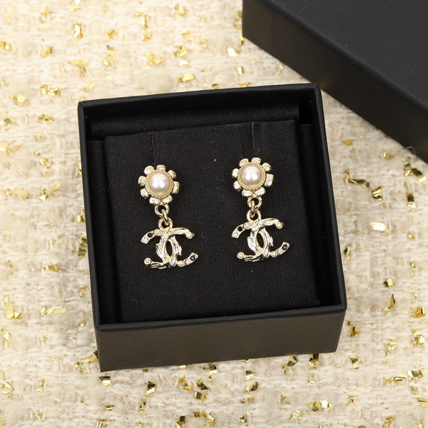 ORECCHINI A PENDENTE CON DIAMANTI MULTIPLI IN ORO E GIRASOLE CC