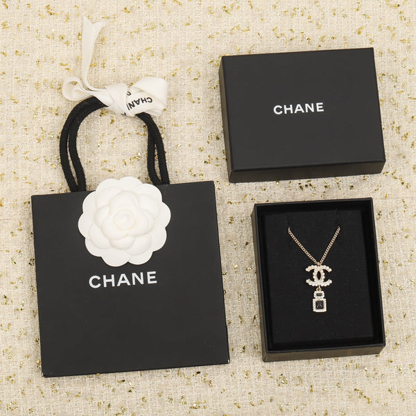 COLLANA IN ORO CON PENDENTE A FORMA DI BOTTIGLIA DI PROFUMO CHANE
