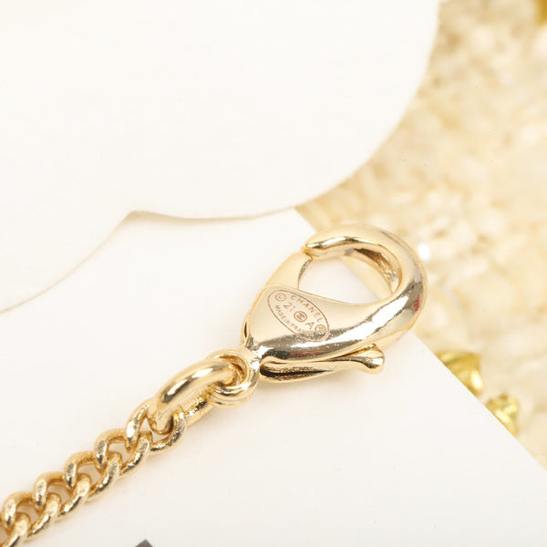 COLLANA IN ORO CON PENDENTE A FORMA DI BOTTIGLIA DI PROFUMO CHANE