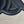 SMALL BUCKET CUIR TRIOMPHE 24CM IN STRIPED TEXTILE AND BLACK CALFSKIN
