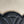 SMALL BUCKET CUIR TRIOMPHE 24CM IN STRIPED TEXTILE AND BLACK CALFSKIN