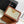 TEEN TRIOMPHE 18.5CM BEIGE MONOGRAM CANVAS AND TAN CALFSKIN