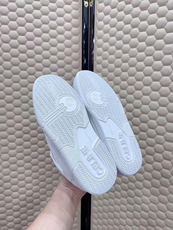 Celin Low Lace-Up Trainers in White PVC Leather