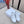 Celin Low Lace-Up Trainers in White PVC Leather